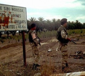 Algerian soldiers stand guard outside Sidi Moussa