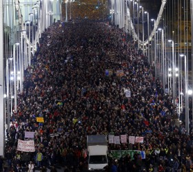 Ten of thousands of Hungarians march across the Elisabeth Bridge during a protest against new tax on Internet data transfers in centre of Budapest
