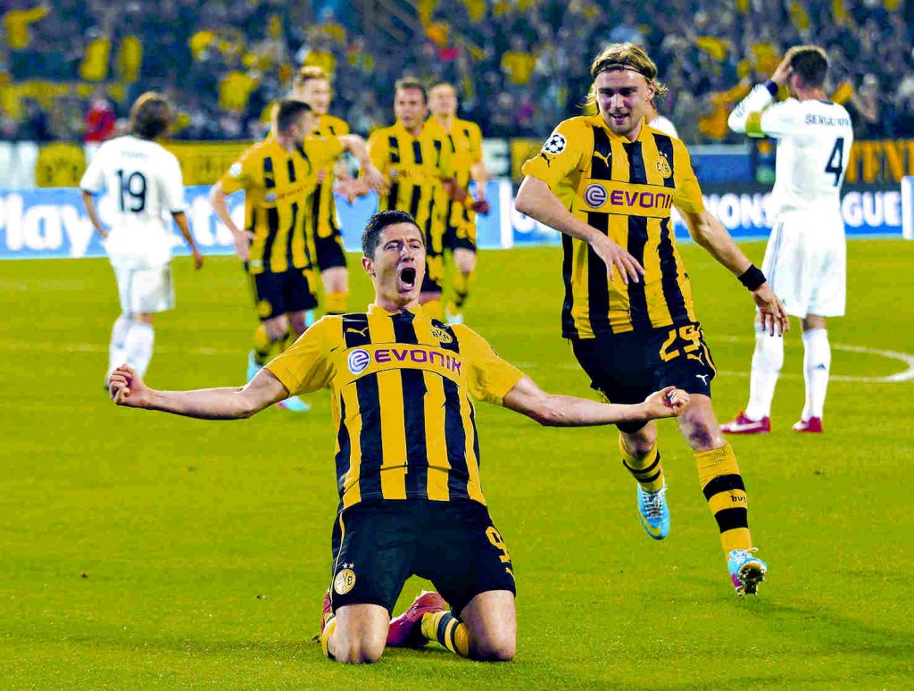 Borussia Dortmund's Lewandowski celebrates scoring hat-trick against Real Madrid in Champions League semi-final first leg soccer match in Dortmund