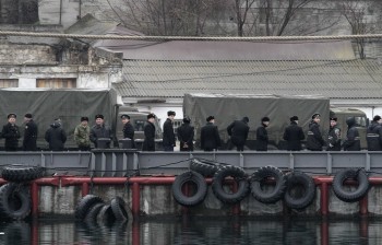 Russian sailors stand in line at a navy base in the Ukrainian Black Sea port of Sevastopol