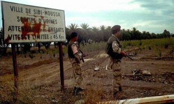 Algerian soldiers stand guard outside Sidi Moussa