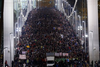 Ten of thousands of Hungarians march across the Elisabeth Bridge during a protest against new tax on Internet data transfers in centre of Budapest